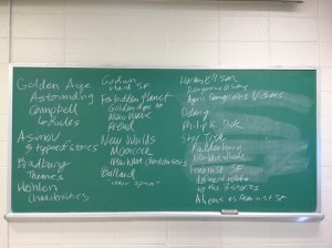 Exam 2 review notes on the chalkboard.