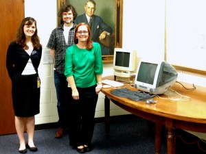 Wendy Hagenmaier, Jason W. Ellis, and Jody Thompson next to Apple Performa 550 and iMac.