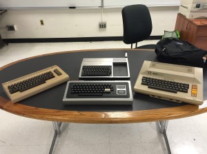 R to L: Commodore 64, TRS-80, TI-99/4A, and Atari 800.