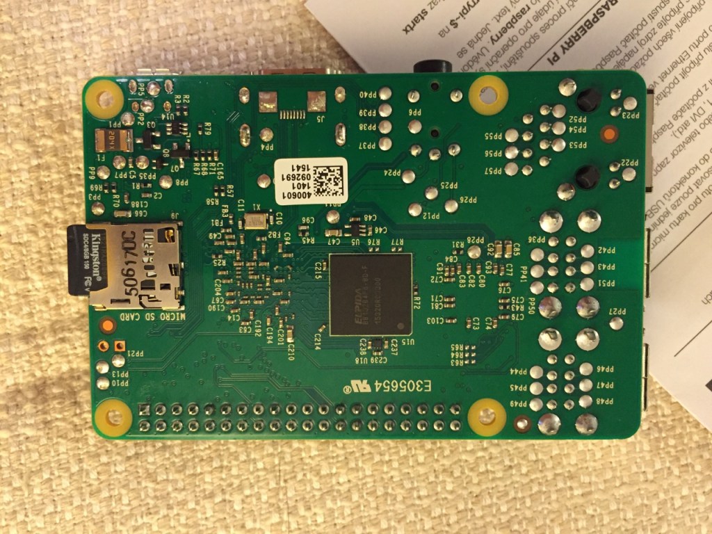 Press the micro SD card in and it will stay in place with a "click."