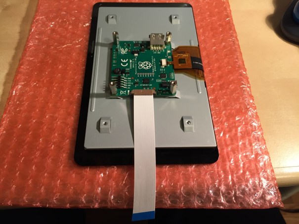 Insert the display cable to the video input on the controller card.