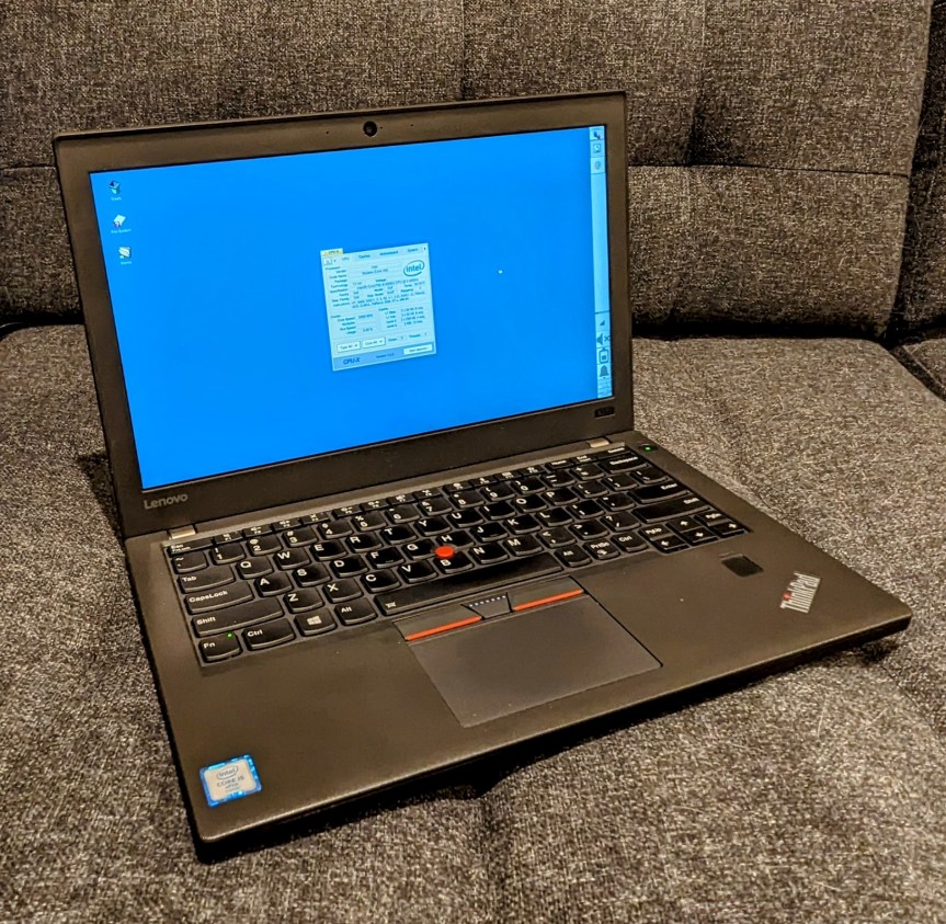 My Lenovo ThinkPad X270 open to the Debian 12 xfce desktop.