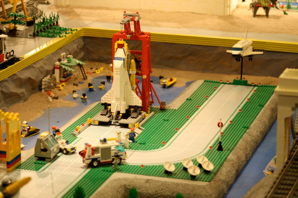 Brick City in Niagara Falls, LEGO sets, custom models, and minifigures on display.