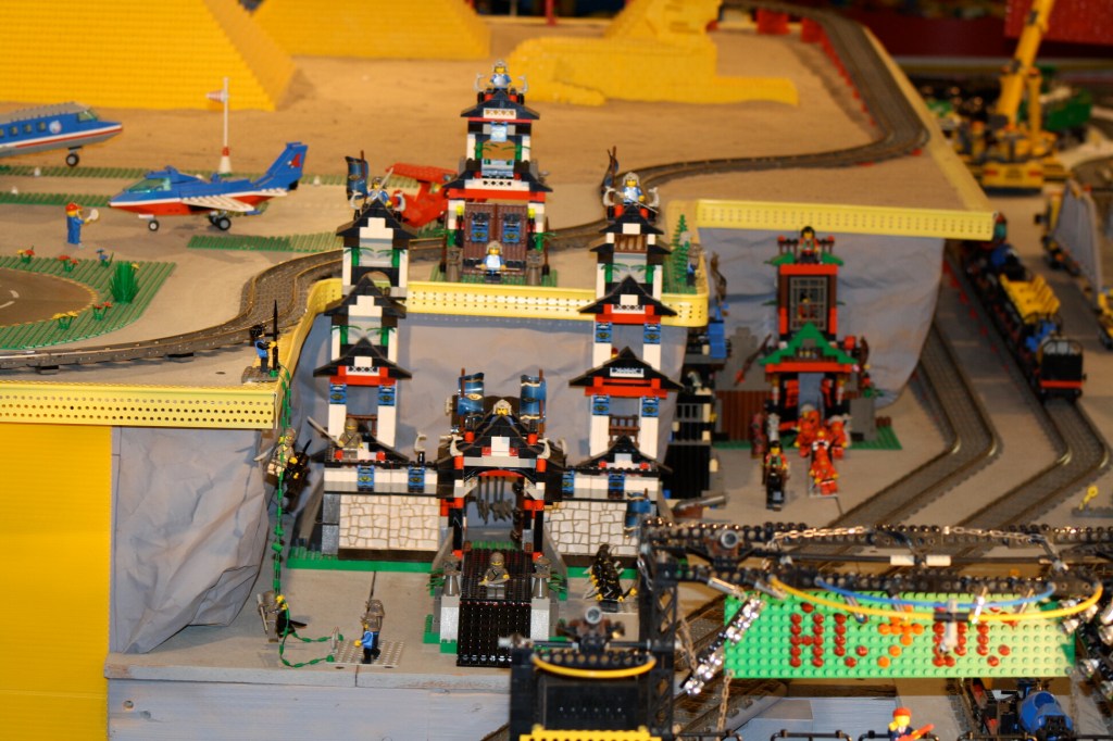 Brick City in Niagara Falls, LEGO sets, custom models, and minifigures on display.