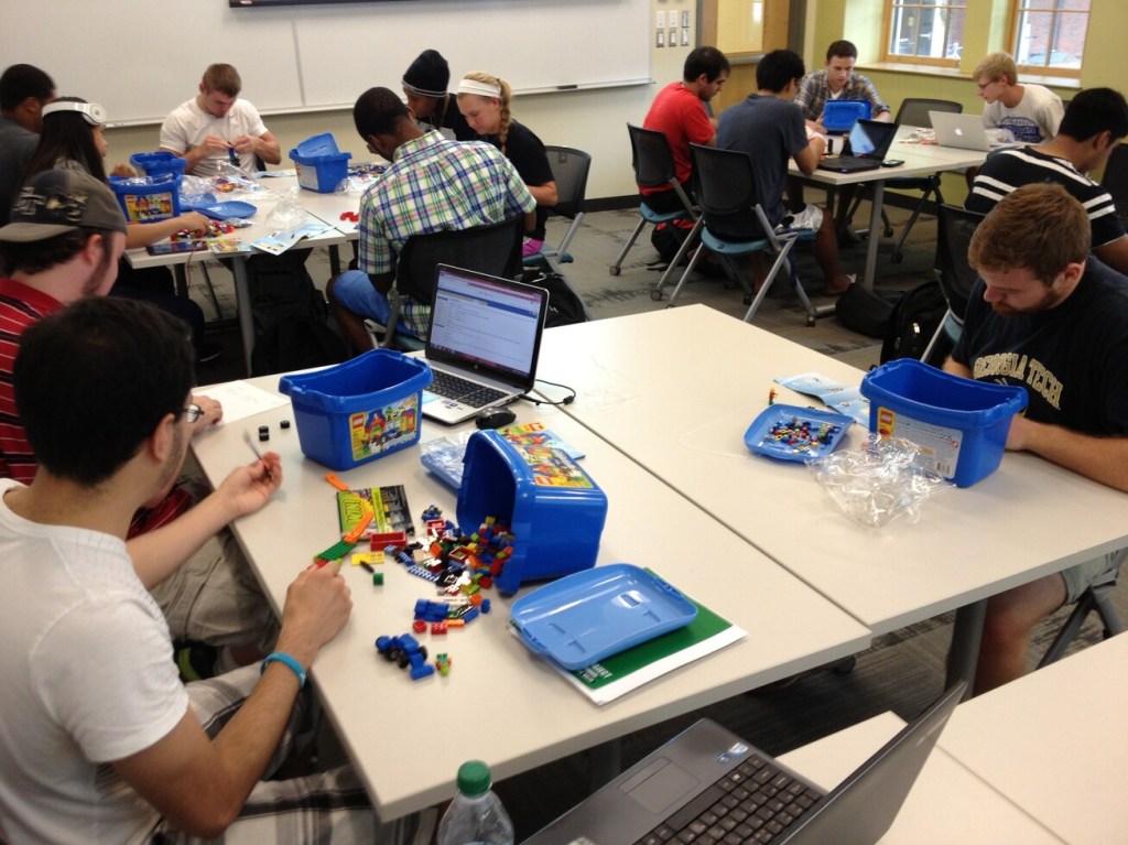 LMC3403 Technical Communication students working with LEGO