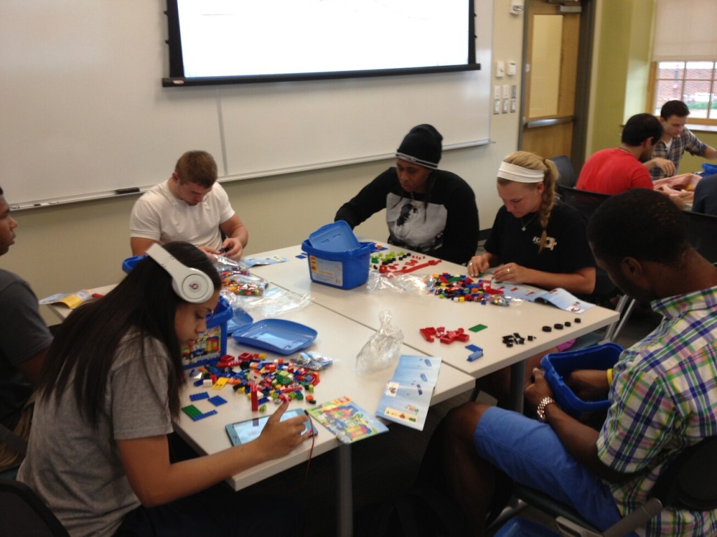 LMC3403 Technical Communication students working with LEGO