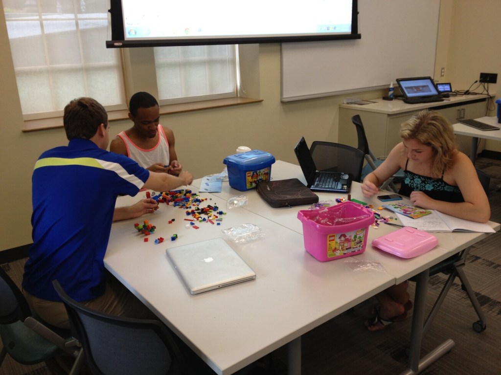 LMC3403 Technical Communication students working with LEGO