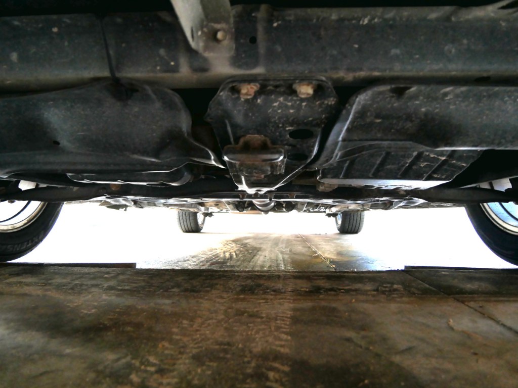Looking underneath 2013 Toyota Corolla.