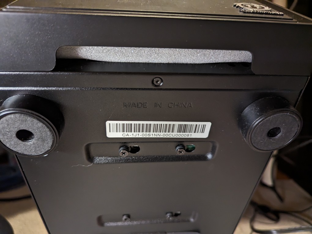 bottom of Thermaltake Versa H17 case with the foam covering the air inlet.