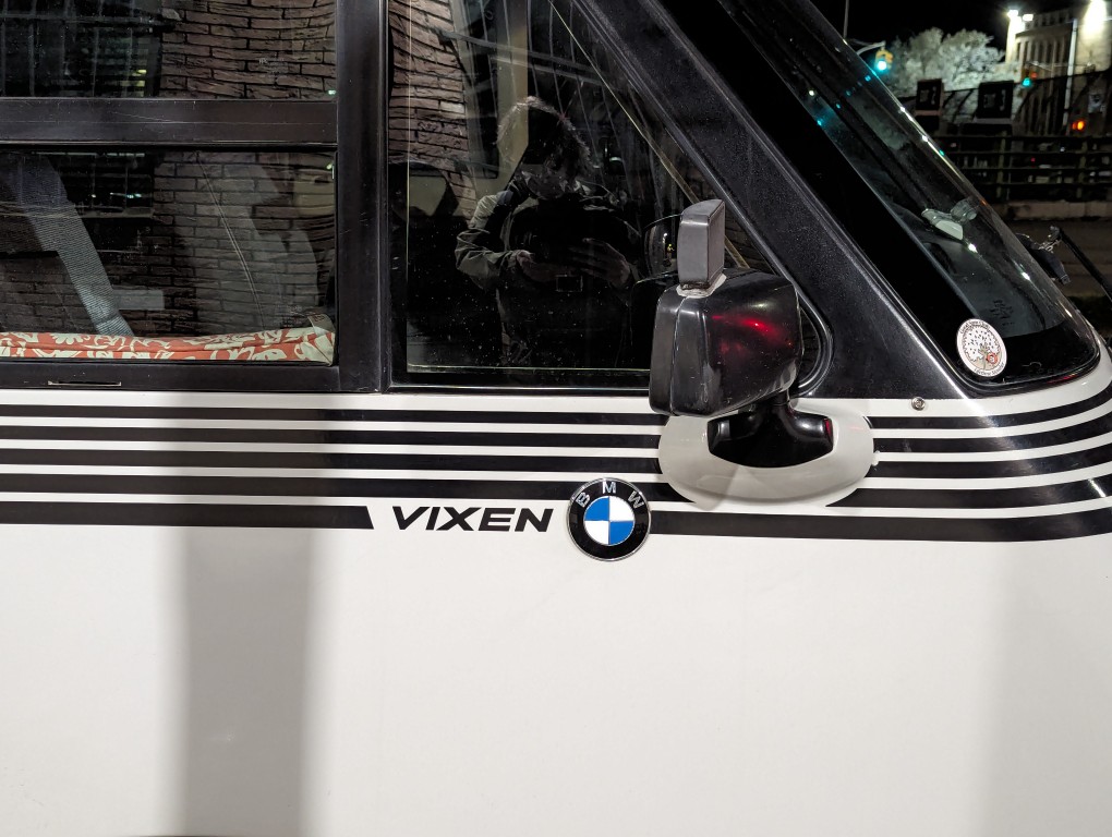 Vixen and BMW logos on passenger side door