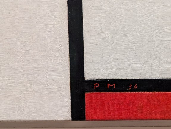 Painting of lines and colored rectangles by Piet Mondrian at MOMA.