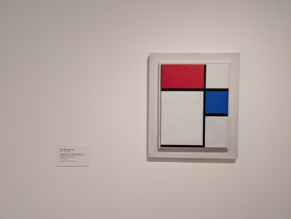 Painting of lines and colored rectangles by Piet Mondrian at MOMA.