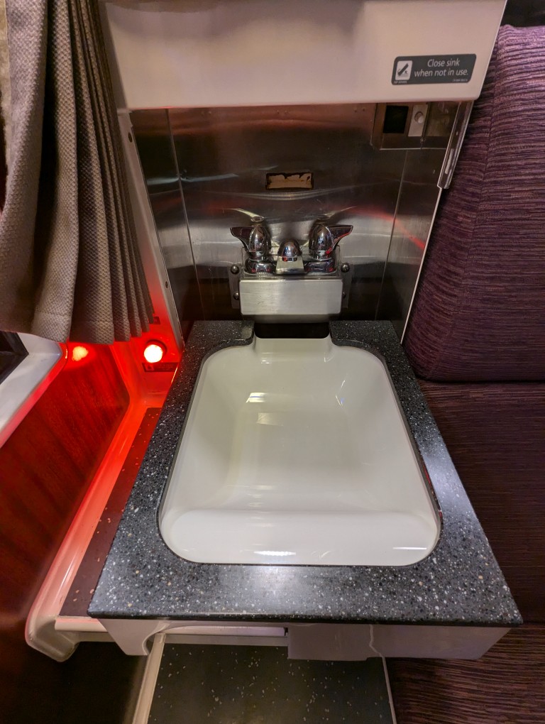 amtrak train roomette sink folded down for use