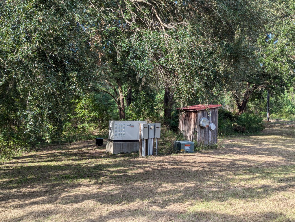 water pump house, 60khw generac whole-house generator, and electrical hookups