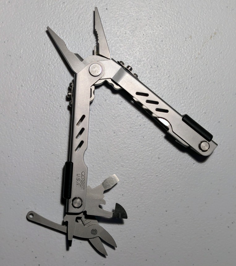 Gerber Multi-Plier 400 Compact Sport, flat head screwdrivers, can opener, and scissors opened