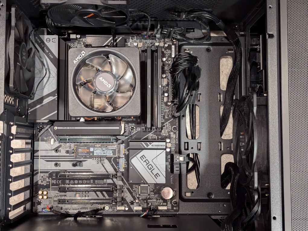 atx motherboard mounted inside a midtower computer case