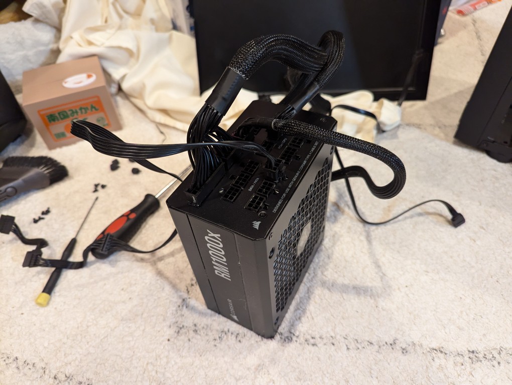 computer power supply with power cables plugged in