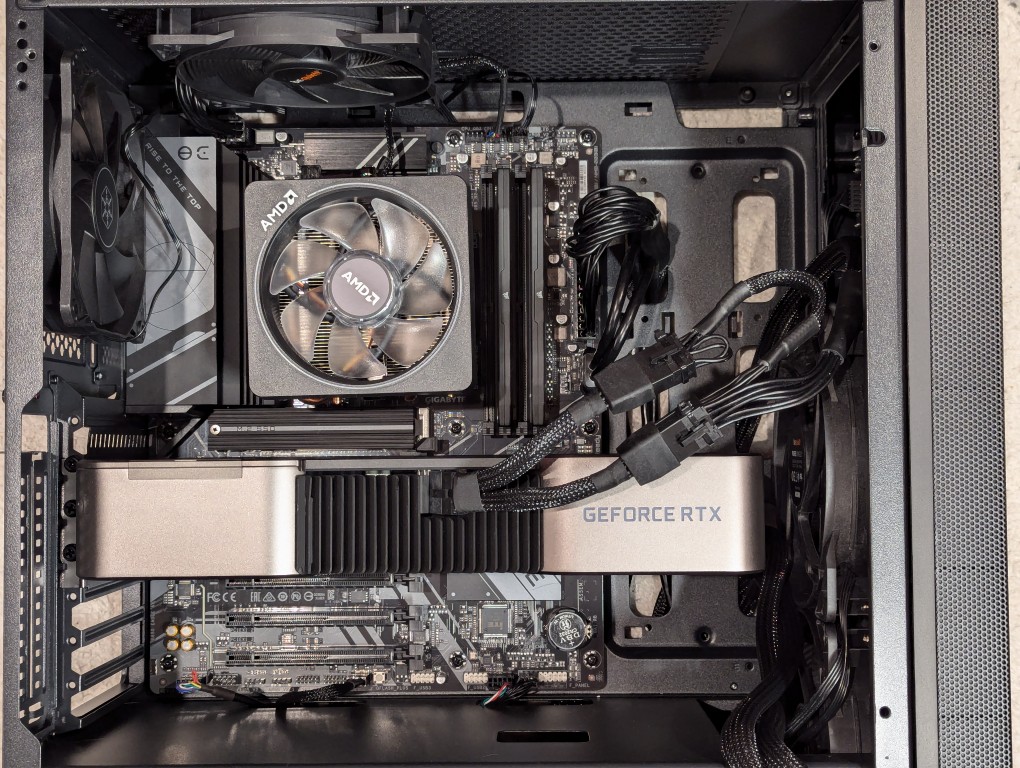 RTX 3090 video card installed on motherboard inside a midtower computer case