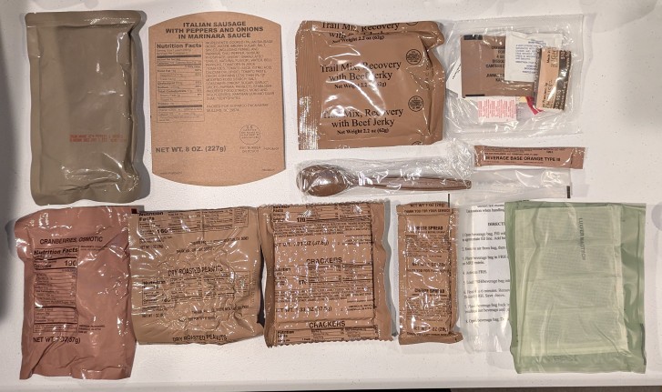 individual plastic bags of food and accessories in mre