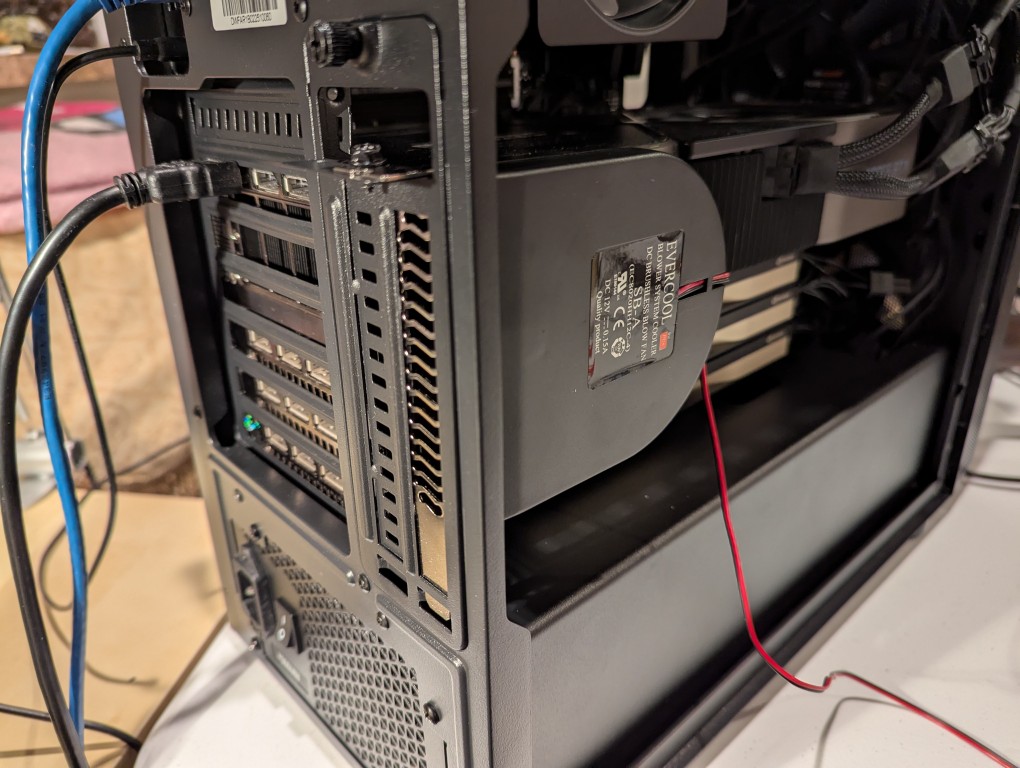 3/4 view of computer case with slot fan installed