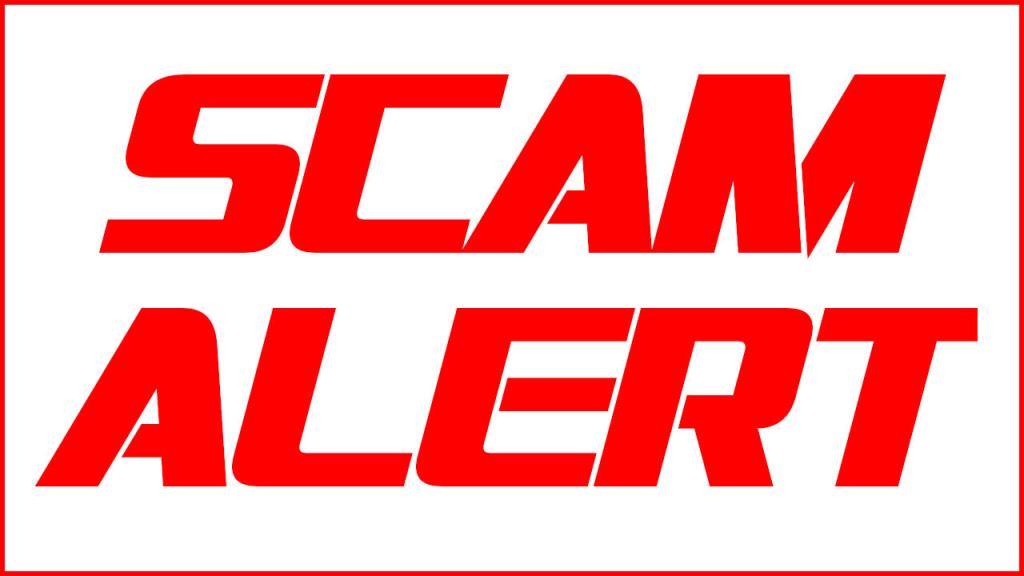 large red lettering that says scam alert