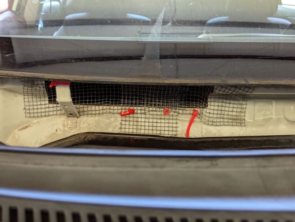 more wire mesh pushed into and over the cabin air intake and secured with zipties