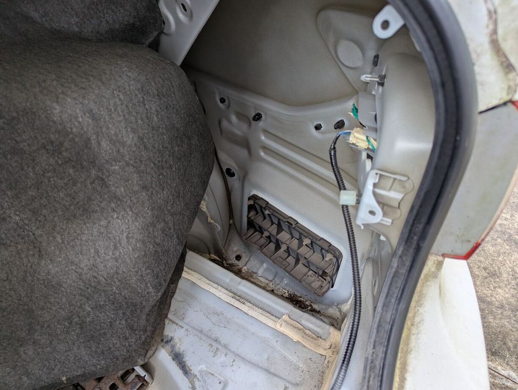 passenger side pressure vent in rear quarter panel