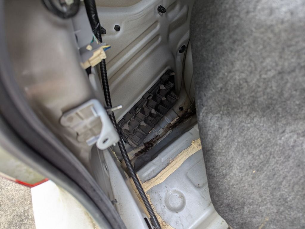 pressure vent on driver side rear quarter panel