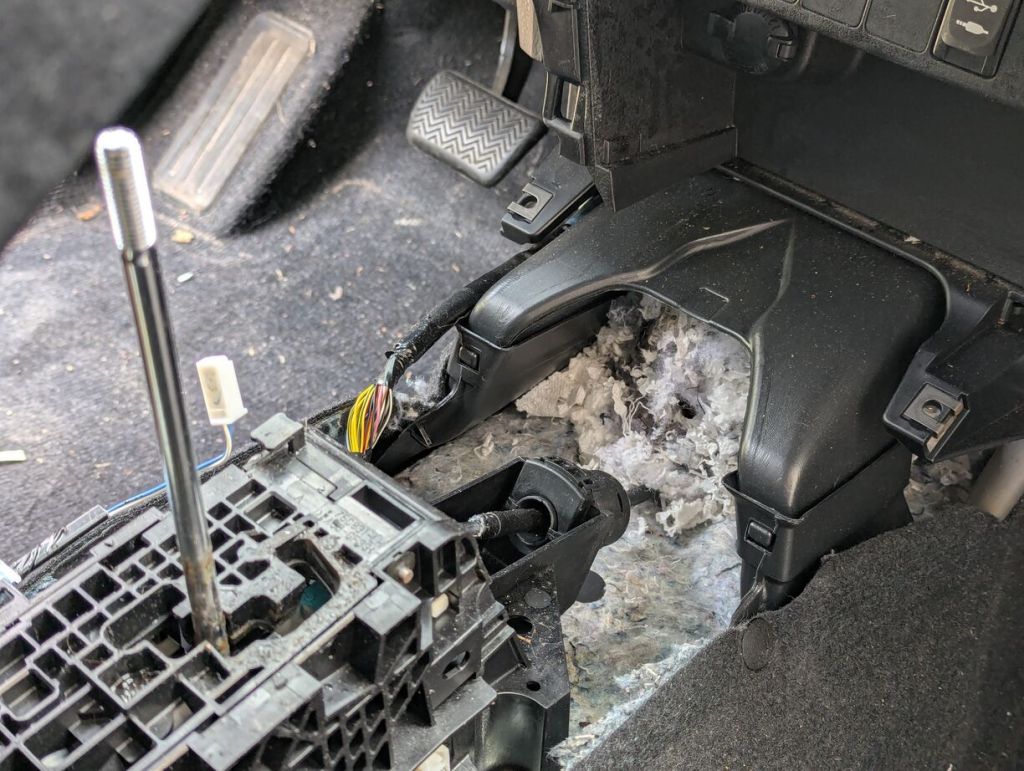 rat nest under disassembled center console of 2017 rav4 