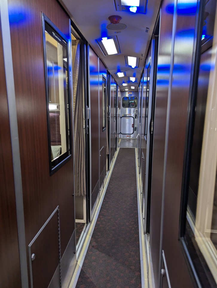 interior hallway of a roomette train car