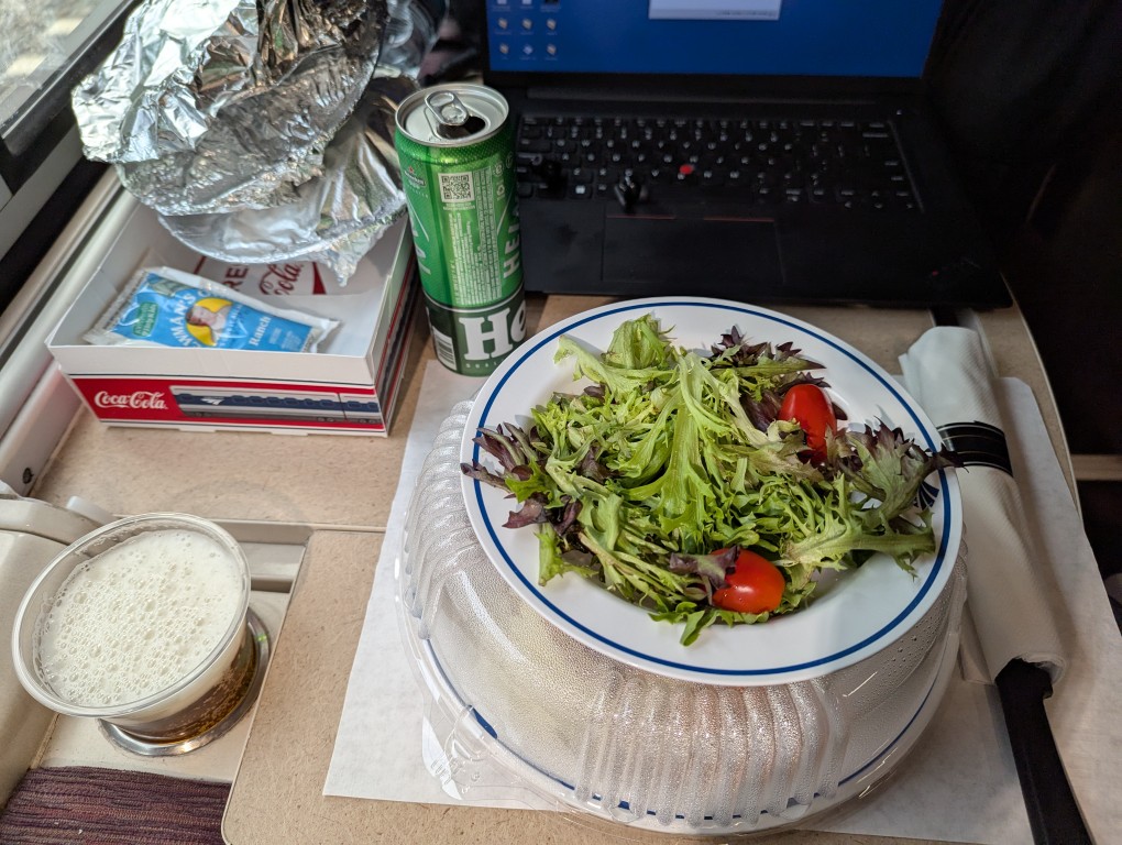 beer in plastic cup and salad