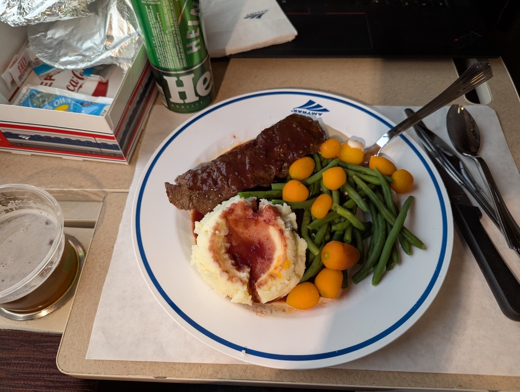 steak dinner with mashed potatoes, green beans, and carrots, 
