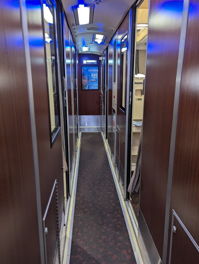 interior hallway of a roomette train car
