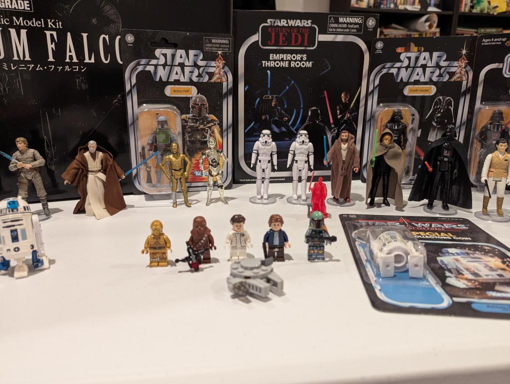 star wars action figure collection of assorted figures, vehicles, playsets, and models