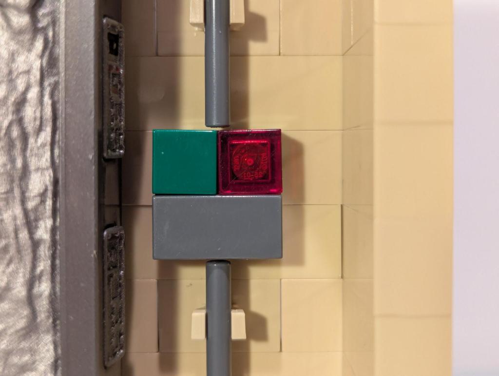 Han Solo in Carbonite displayed in an alcove of Jabba's Palace built out of tan LEGO bricks.